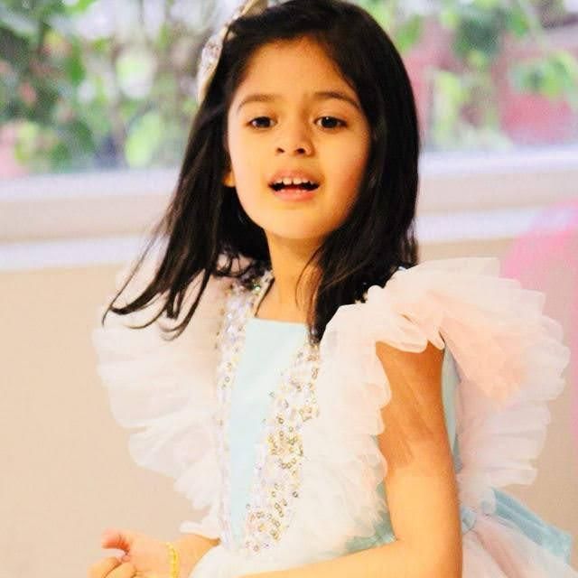 Unnati Raj mid-conversation, smiling at the camera